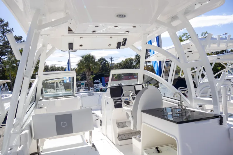 Slide: The Image of 2025 Sea Fox 268 Traveler boat interior with modern helm and seating. - 21