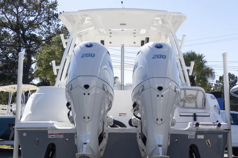 Slide: The Image of 2025 Sea Fox 268 Traveler boat with dual 200 horsepower engines, rear view. - 33