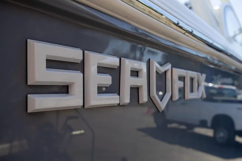 Slide: The Image of Close-up of 2025 Sea Fox 268 Traveler boat logo on hull. - 7