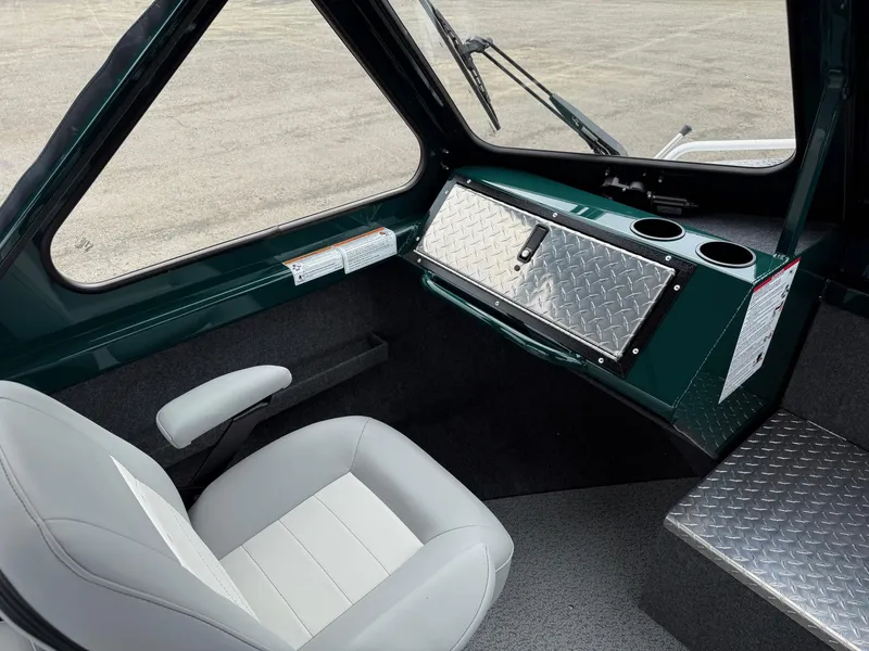 Slide: The Image of Interior of 2025 Thunder Jet 210 Luxor boat with modern seating and dashboard. - 19
