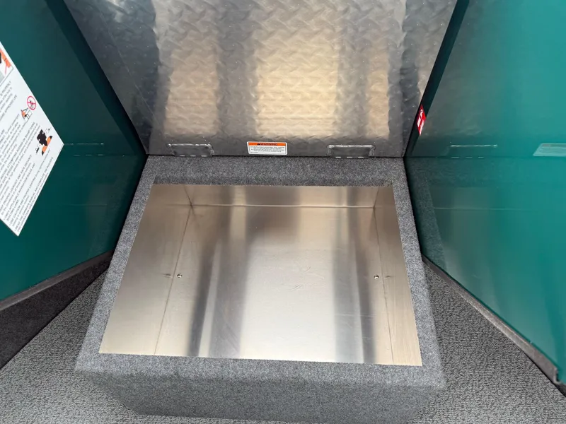 Slide: The Image of Storage compartment in 2025 Thunder Jet 210 Luxor boat, featuring a metallic interior and textured exterior. - 20