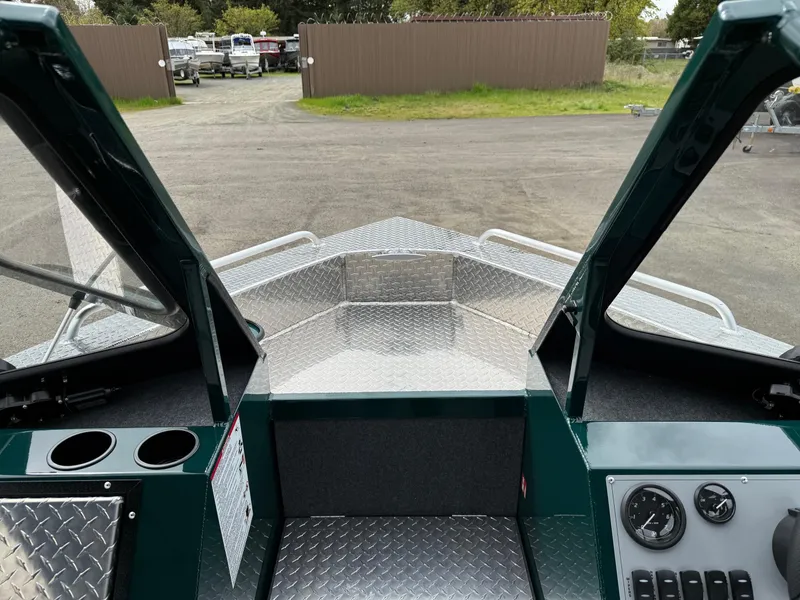 Slide: The Image of 2025 Thunder Jet 210 Luxor boat interior with open bow and dashboard view. - 21