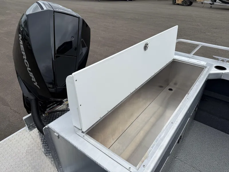 Slide: The Image of 2025 Thunder Jet 210 Luxor boat with Mercury engine and open storage compartment. - 9