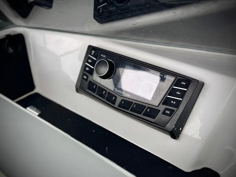 Slide: The Image of Dashboard of 2020 Cobalt 220S boat featuring a Rockford Fosgate audio system. - 25