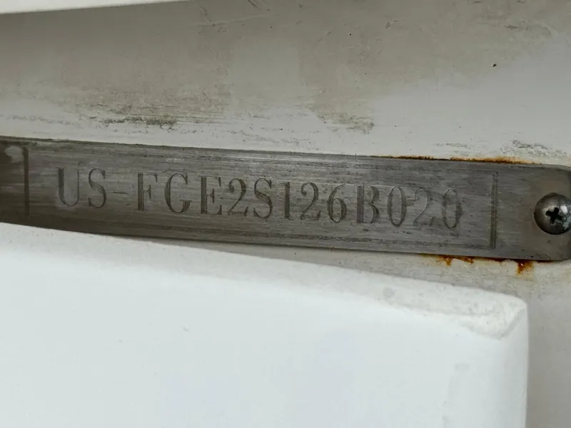 Slide: The Image of Hull identification number on a 2020 Cobalt 220S boat. - 32