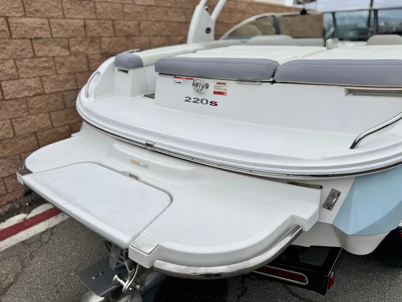 Slide: The Image of 2020 Cobalt 220S boat rear view with swim platform and seating. - 6