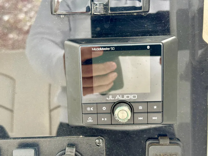 Slide: The Image of JL Audio MediaMaster 50 on 2019 Sea Hunt Gamefish 25 dashboard. - 10