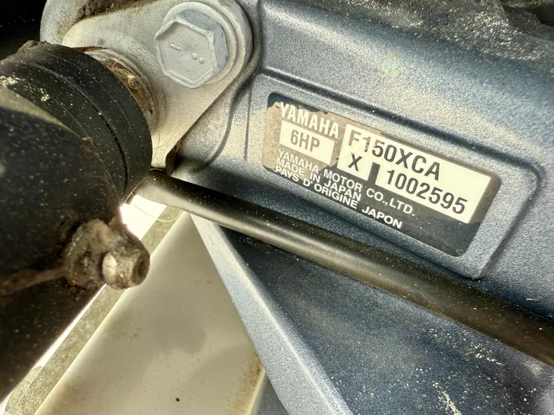 Slide: The Image of Close-up of Yamaha F150XCA engine label on 2019 Sea Hunt Gamefish 25 boat. - 31