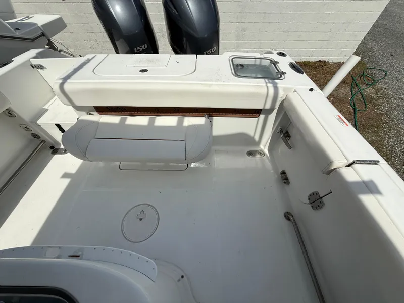 Slide: The Image of 2019 Sea Hunt Gamefish 25 boat deck with seating and dual engines. - 36