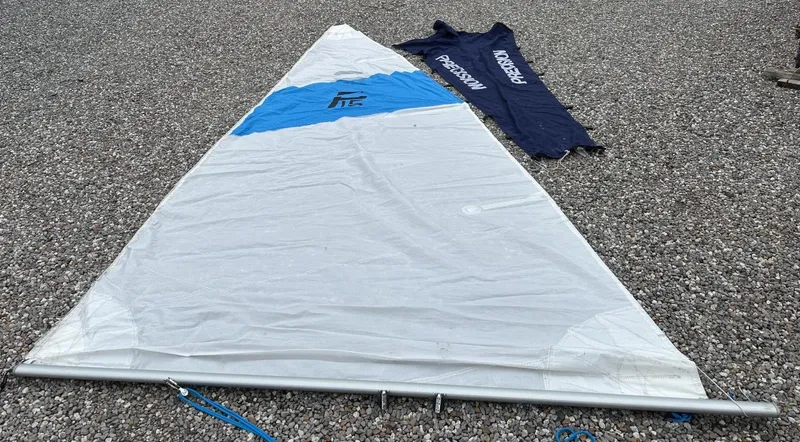 Slide: The Image of Sailboat sail on gravel, Precision 15 model, 2012, with blue and white design. - 8