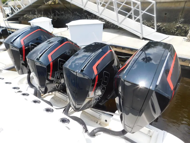 Slide: The Image of Four powerful outboard motors on a 2013 Hydra-Sports 4200 Siesta boat. - 3