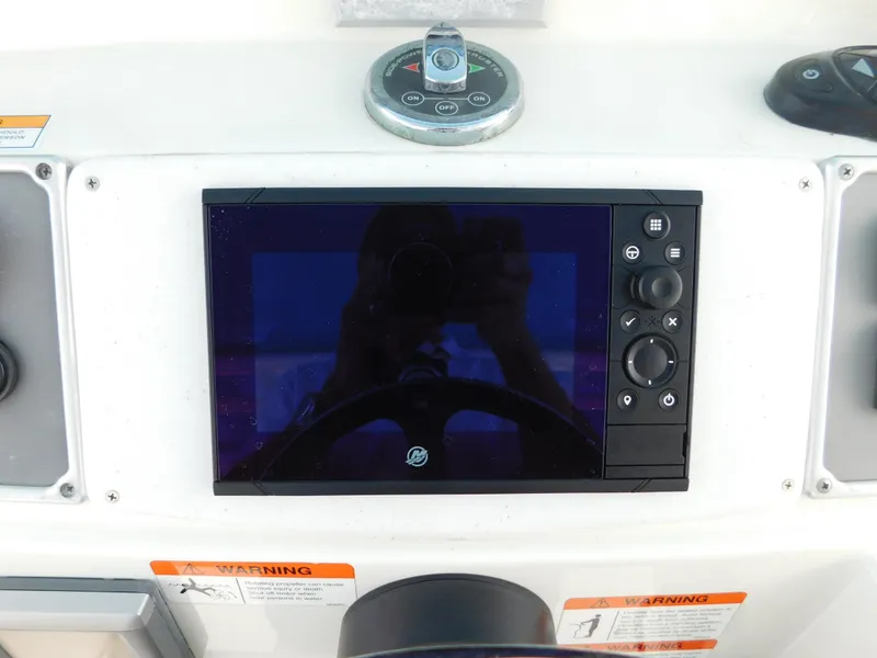 Slide: The Image of Control panel of 2013 Hydra-Sports 4200 Siesta boat with navigation display. - 36