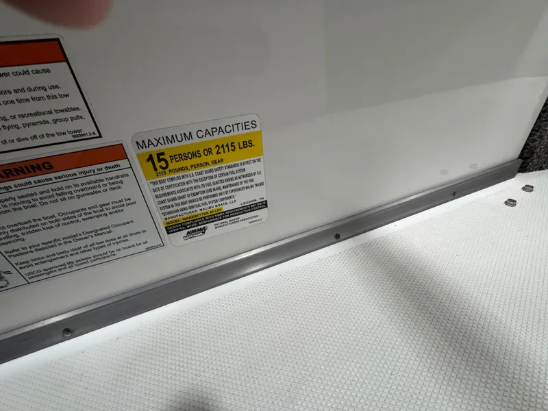 Slide: The Image of 2017 Malibu Wakesetter 23 LSV capacity label, maximum 15 persons or 2115 lbs. - 11