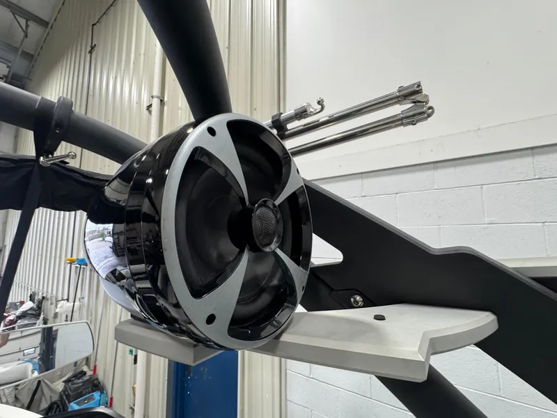 Slide: The Image of 2017 Malibu Wakesetter 23 LSV boat speaker and wakeboard rack in a garage. - 15