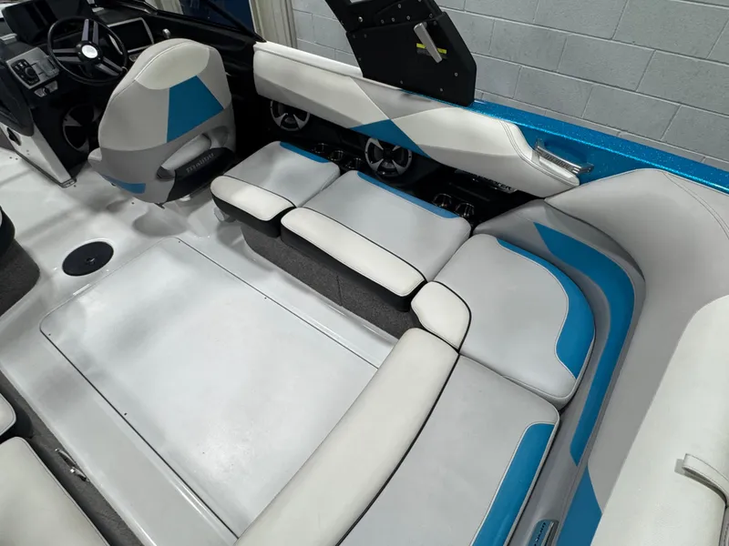 Slide: The Image of 2017 Malibu Wakesetter 23 LSV interior with white and blue seating. - 6