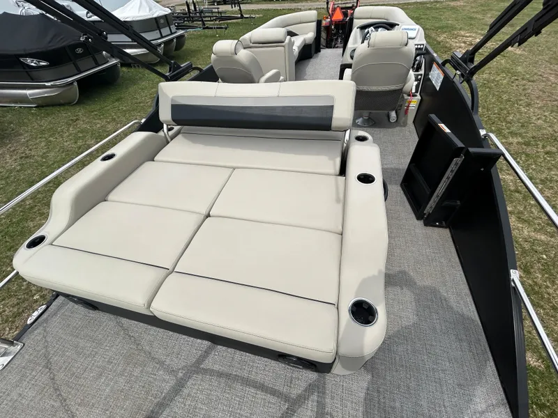 Slide: The Image of 2021 Barletta C24UC Triple Toon pontoon boat with spacious seating and cup holders. - 23