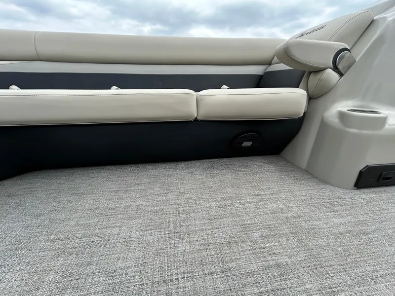Slide: The Image of 2021 Barletta C24UC Triple Toon interior with beige seating and gray carpet. - 27