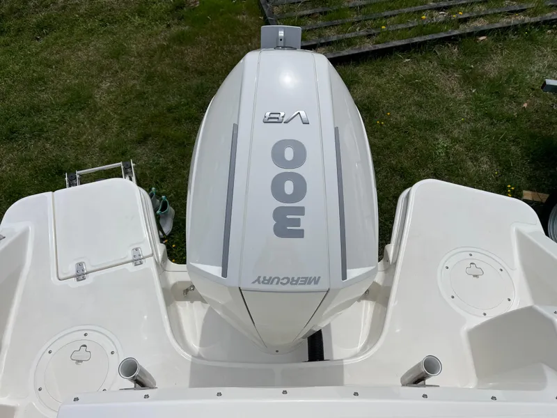 Slide: The Image of 2025 Boston Whaler 240 Vantage with Mercury 300 V8 engine, top view. - 9