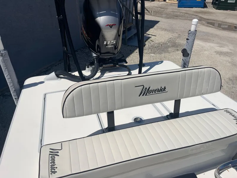 Slide: The Image of 2019 Maverick Mirage 18 HPX-V boat with Yamaha 115 engine, featuring cushioned seating. - 12