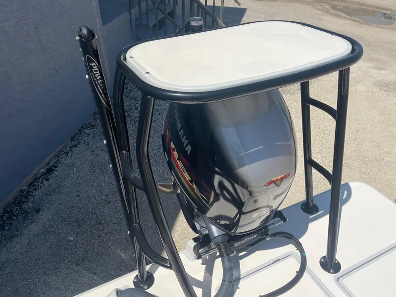 Slide: The Image of 2019 Maverick Mirage 18 HPX-V boat with Yamaha outboard motor and Power-Pole anchor system. - 18