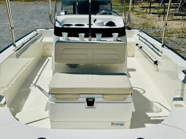 Slide: The Image of 2018 Boston Whaler 170 Montauk boat interior with seating and console. - 9