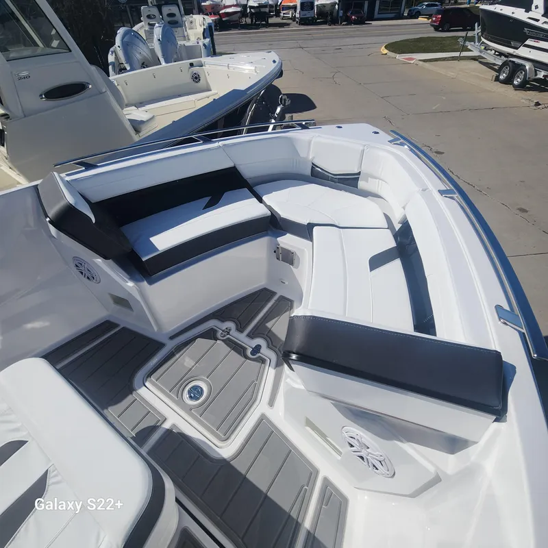 Slide: The Image of 2025 Monterey Elite 27 OB boat interior with sleek seating and modern design. - 8