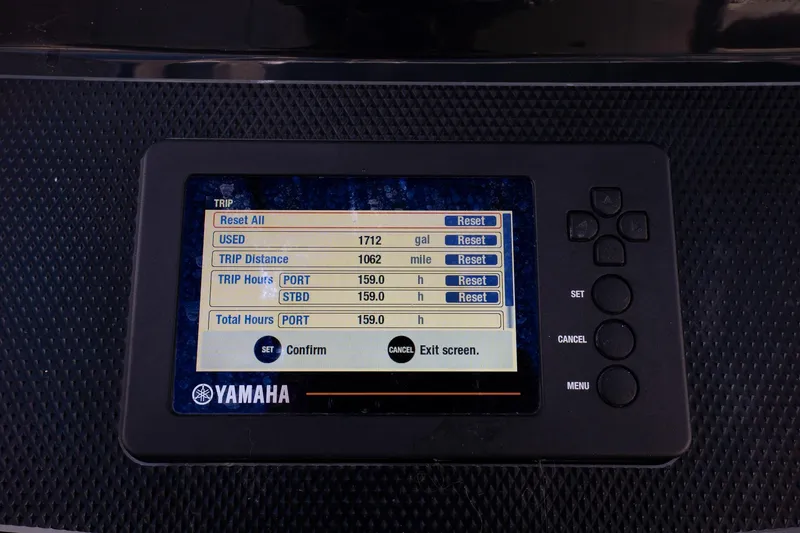 Slide: The Image of Yamaha display on 2018 Wellcraft 302 Fisherman showing trip data and settings. - 25