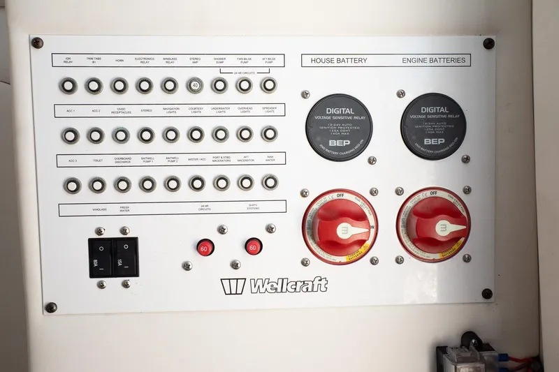Slide: The Image of Control panel of a 2018 Wellcraft 302 Fisherman boat with battery switches and indicators. - 29
