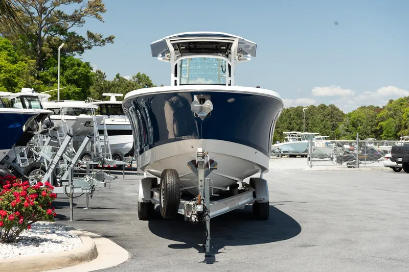 Slide: The Image of 2018 Wellcraft 302 Fisherman boat on trailer in sunny outdoor setting. - 4