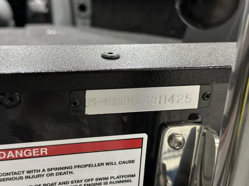Slide: The Image of 2025 Alumacraft Competitor 175X Sport boat serial number and safety warning label. - 19