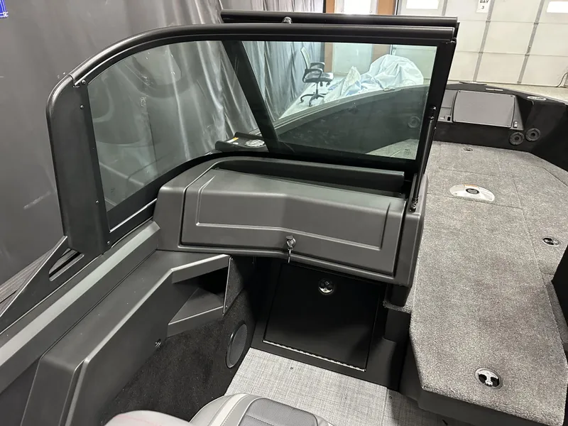 Slide: The Image of 2025 Alumacraft Competitor 175X Sport interior, featuring sleek design and spacious seating. - 9