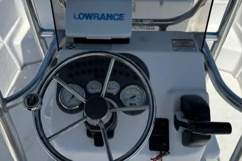Slide: The Image of Steering console of 2011 Carolina Skiff 198 DLV with Lowrance navigation system. - 11