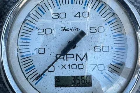 Slide: The Image of Tachometer showing 3560 RPM on a 2011 Carolina Skiff 198 DLV boat. - 12