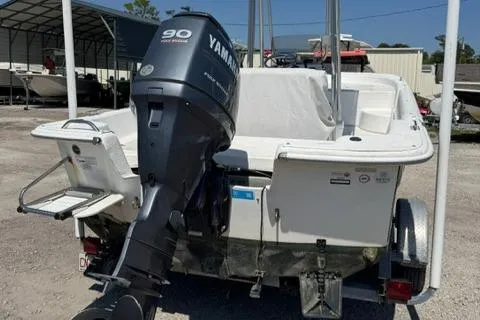 Slide: The Image of 2011 Carolina Skiff 198 DLV boat with Yamaha 90 HP outboard motor. - 6