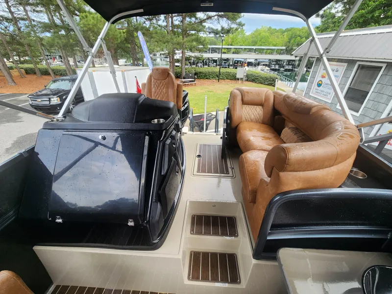 Slide: The Image of 2021 Premier 290 Grand View boat interior with leather seating and sleek console design. - 14