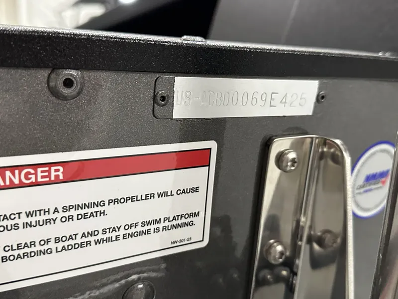 Slide: The Image of 2025 Alumacraft Competitor 175X Sport boat warning label and serial number plate. - 27