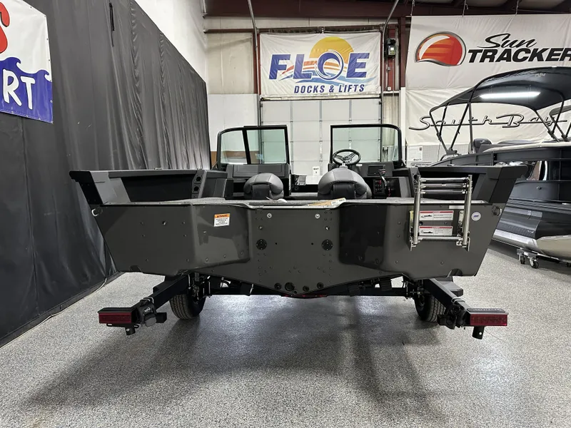 Slide: The Image of 2025 Alumacraft Competitor 175X Sport boat on trailer in showroom. - 3