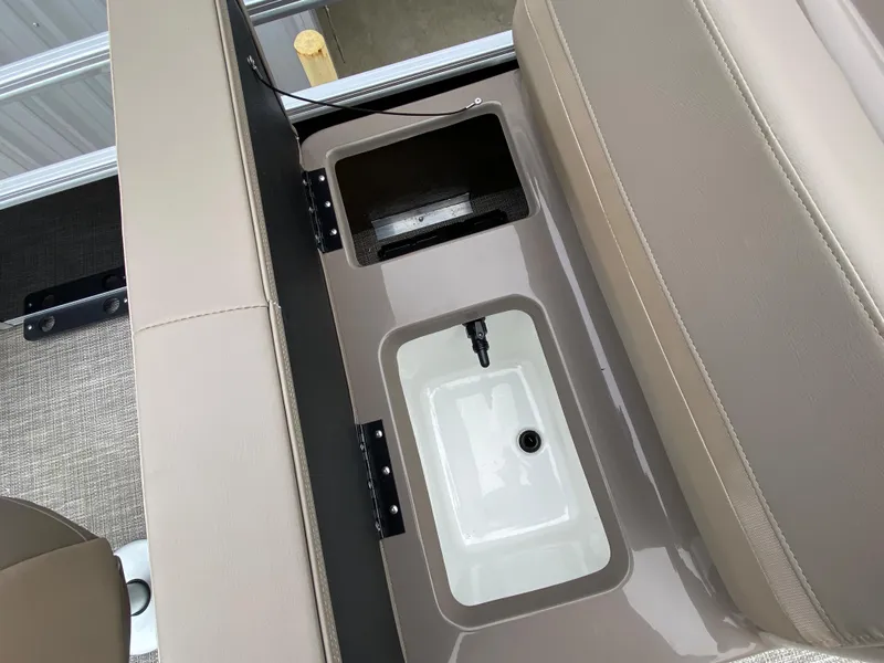 Slide: The Image of Interior view of 2023 Ranger 200F boat seat storage compartments. - 3