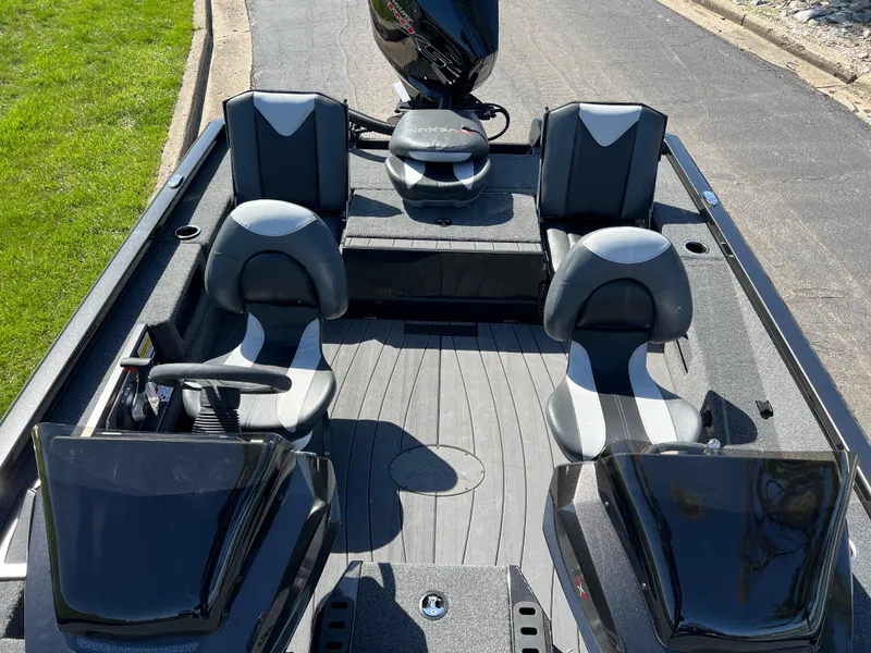 Slide: The Image of 2025 Vexus AVX1985S boat interior with four seats and sleek design. - 21