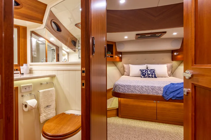 Slide: The Image of Luxurious cabin interior of 2021 Palm Beach Motor Yachts PB65 with ensuite bathroom. - 22
