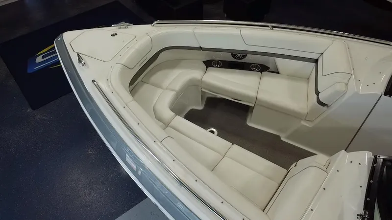 Slide: The Image of 2018 Formula 290 Bowrider with spacious white seating and sleek design. - 10