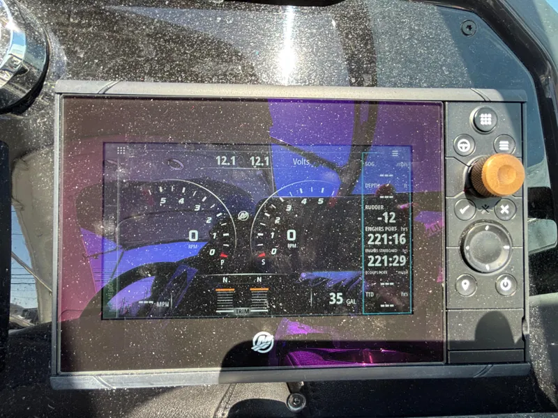 Slide: The Image of 2018 Formula 290 Bowrider interior with spacious seating and modern dashboard. - 21