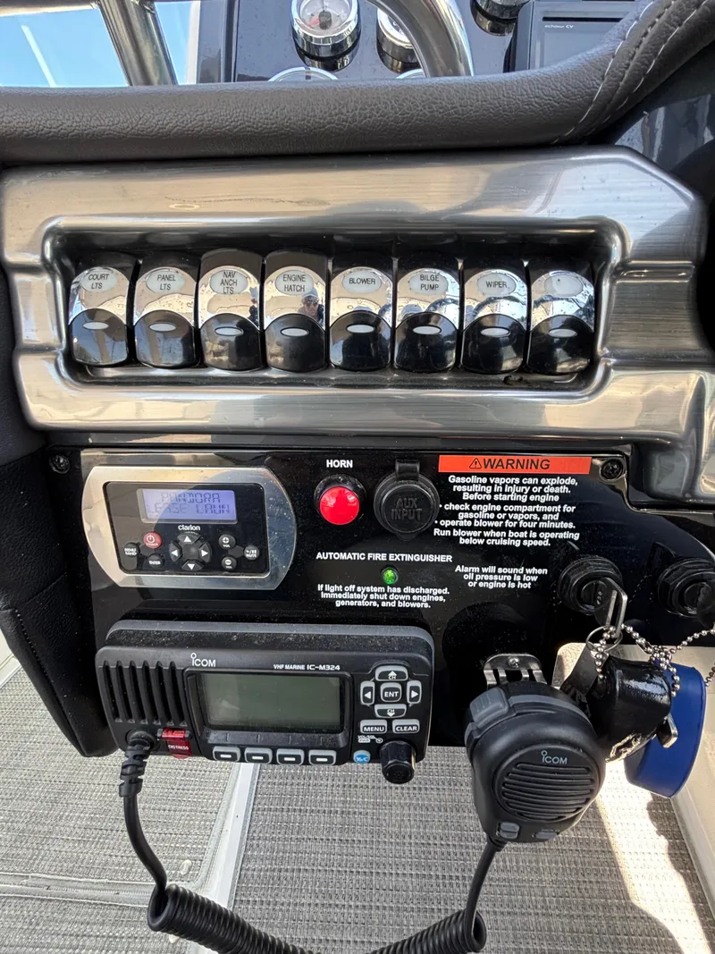 Slide: The Image of 2018 Formula 290 Bowrider bathroom interior with modern fixtures and wood-style flooring. - 29