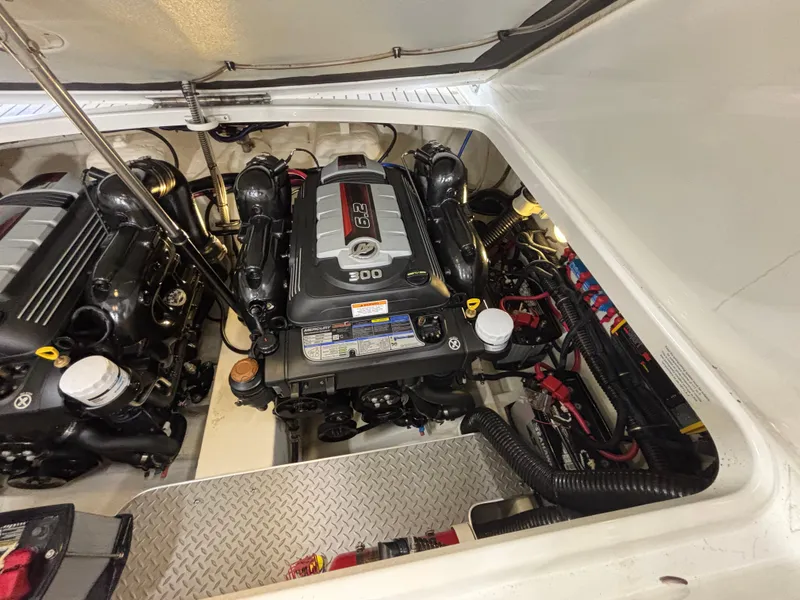 Slide: The Image of Engine compartment of a 2018 Formula 290 Bowrider with dual Mercury engines. - 37