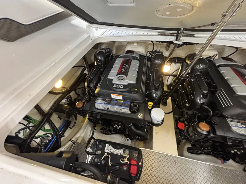 Slide: The Image of 2018 Formula 290 Bowrider anchor compartment open at dock. - 38