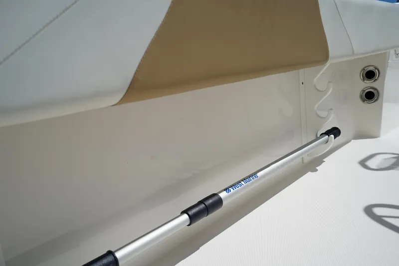 Slide: The Image of Edgewater 188CC 2021 boat interior with rod holder and seating detail. - 15