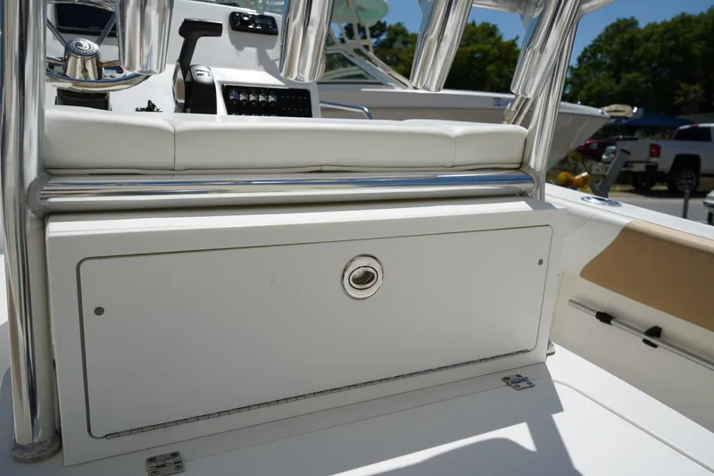 Slide: The Image of 2021 Edgewater 188CC boat interior with storage compartment and seating. - 18