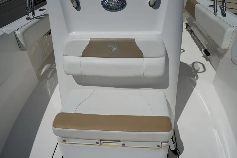 Slide: The Image of 2021 Edgewater 188CC boat seating with white and tan cushions. - 34