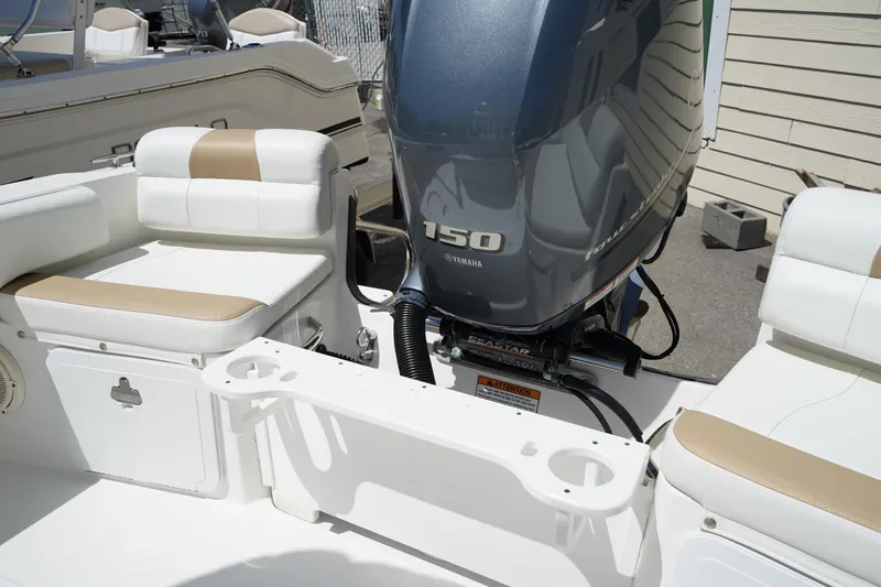 Slide: The Image of Edgewater 188CC 2021 boat with Yamaha 150 engine and cushioned seating. - 8