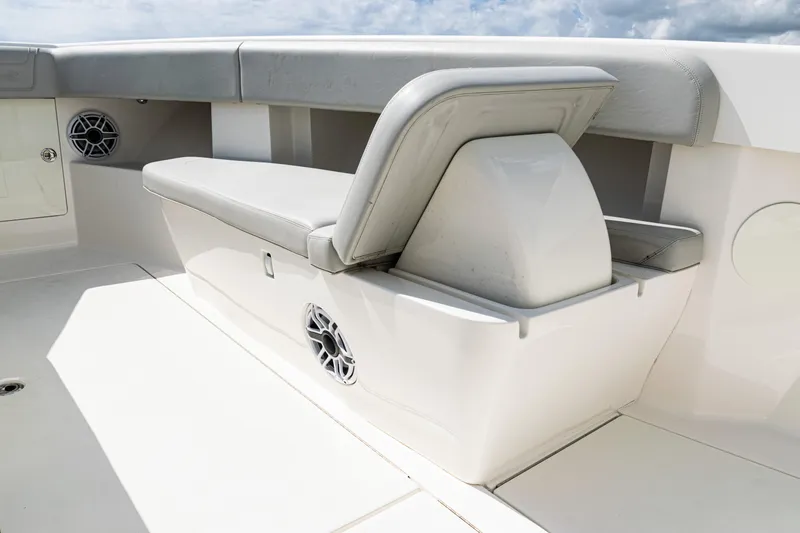 Slide: The Image of 2022 SeaVee 370z boat interior with cushioned seating and built-in speakers. - 10